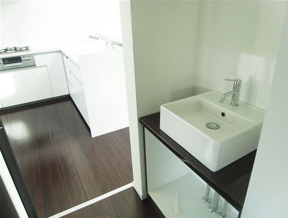 Wash basin, toilet. B Building basin