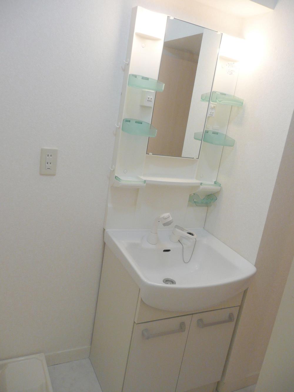 Wash basin, toilet. Bathroom vanity