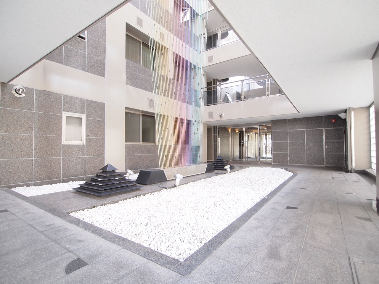 Other common areas. Atrium that extends to the roof will expand the brightness.