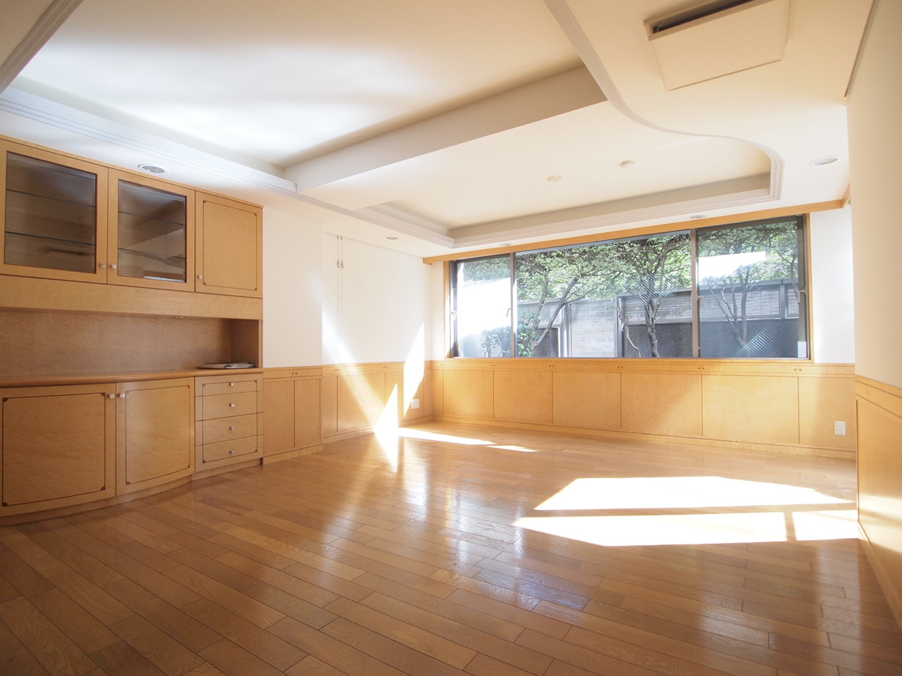 Living and room. Living: cupboard of woodgrain will brew a sense of luxury.