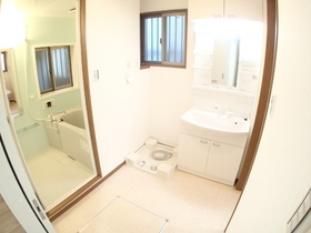 Washroom. Underfloor Storage also to wash room