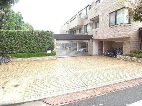 Other common areas. Apartment parking lot entrance there is a gate