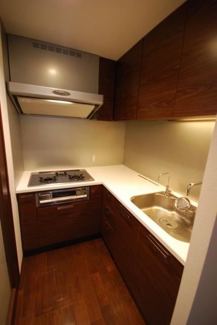 Kitchen. L-shaped kitchen equipped