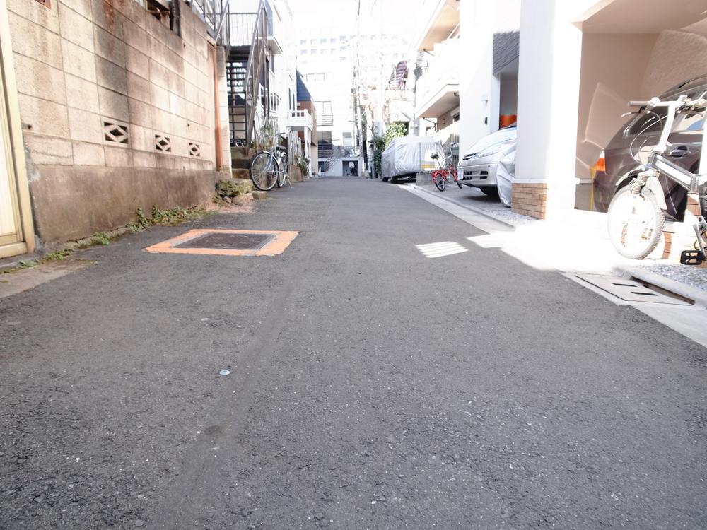 Local photos, including front road. North road and clean property with a road is priceless