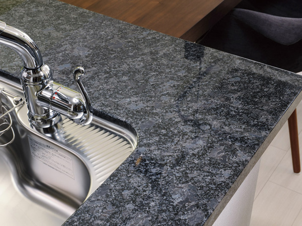 Kitchen.  [Natural stone kitchen counter] Adopt a system kitchen was also expressed beauty of an interior. Top plate decorated with natural stone, It enhances the feeling of luxury and functionality.
