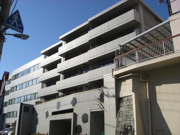 Local appearance photo. Mansion nestled in a quiet corner