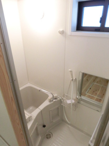 Bath. Bathroom with a window, Shower space