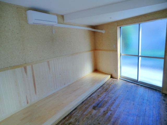 Living and room. OK even if multiplied by bicycle on the wall. 