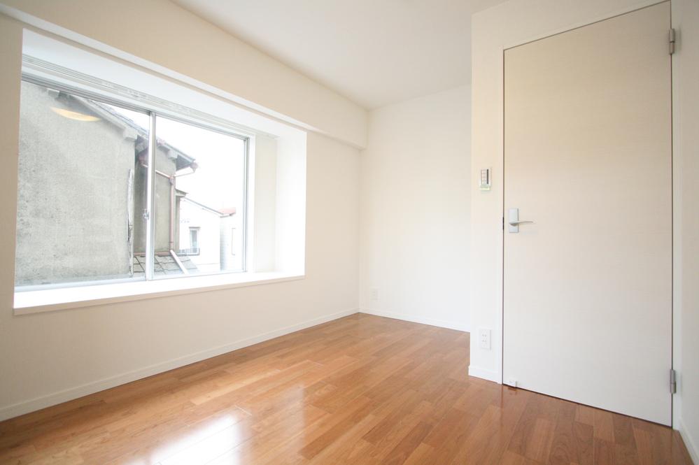 Non-living room. Since the bay windows will spread the width of the interior, such as placing a houseplant