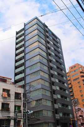 Local appearance photo. The building exterior is a picture. Is the appearance that there is a profound sense of the paste gray tile.