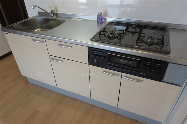 Kitchen. 3-neck is cooking Hakadori likely in the stove