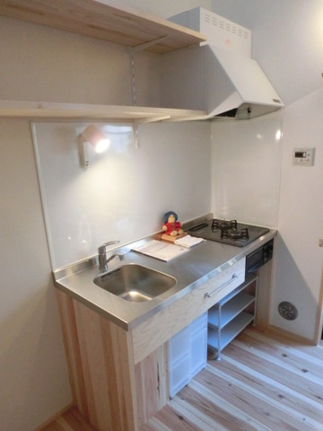 Kitchen. Fixtures mini kitchen. Grill with.