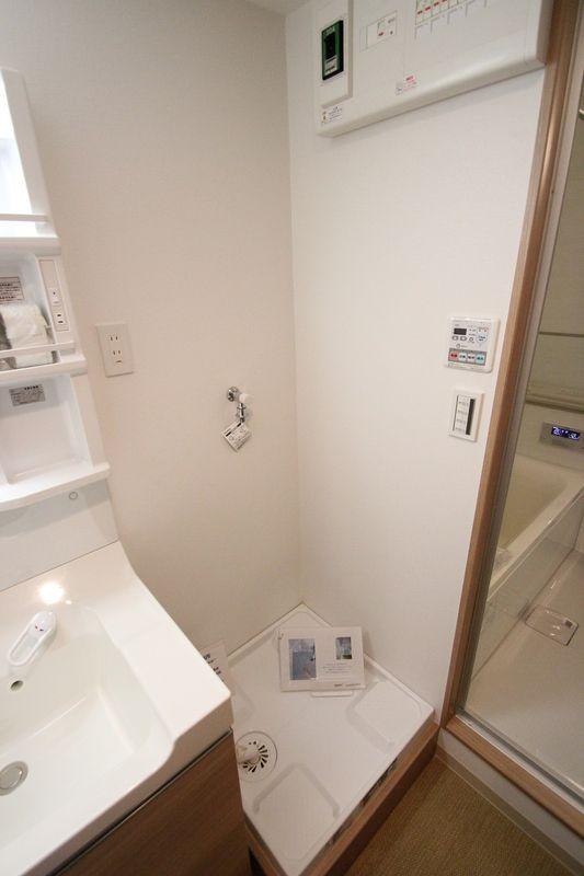 Wash basin, toilet. Washing machine Storage