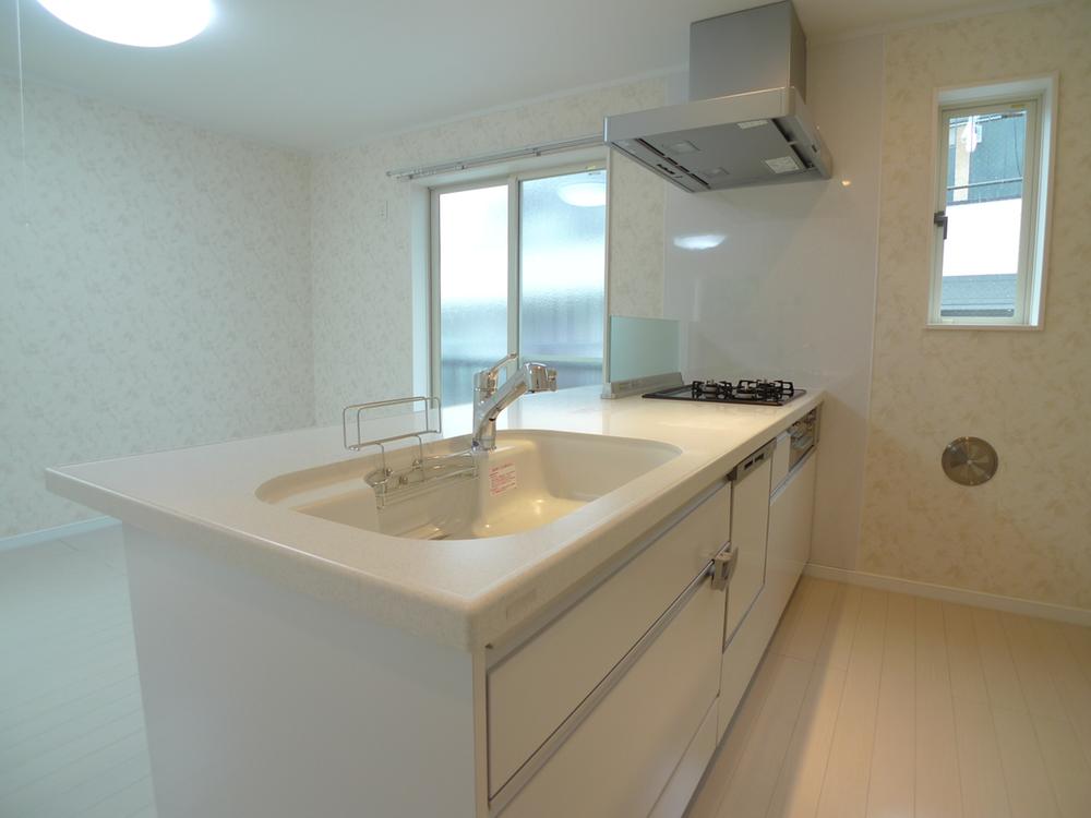 Kitchen. Large kitchen of artificial marble top