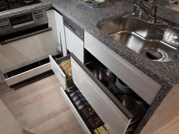 Kitchen.  [Under stocker] It is also clean and housed a large bowl or pot, Standard equipment the amount of storage rich under-stocker. Drawer is soft with close function to close quietly.