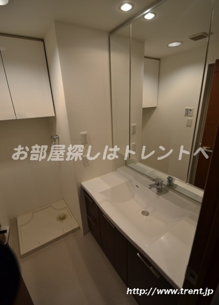 Washroom. It is a photograph of the same building (another type). Please see for reference.