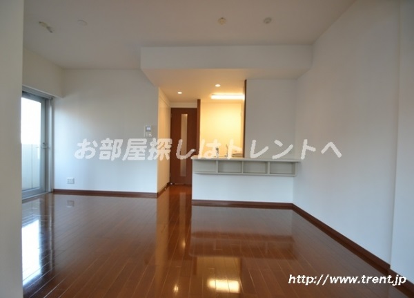 Living and room. It is a photograph of the same building (another type). Please see for reference.