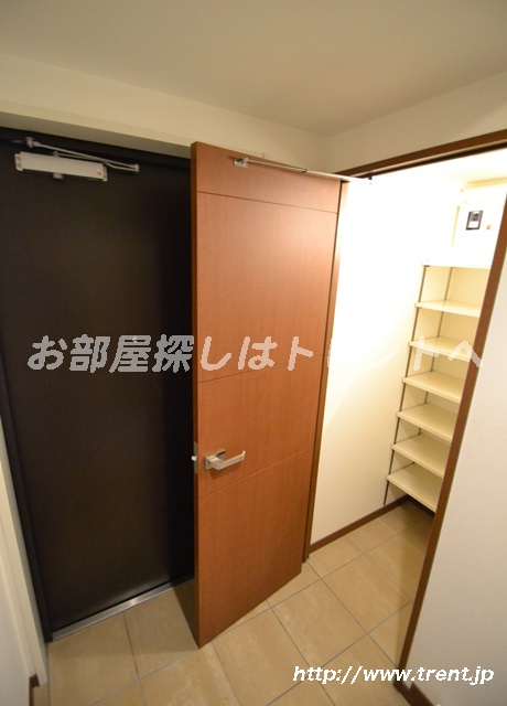 Entrance. It is a photograph of the same building (another type). Please see for reference.