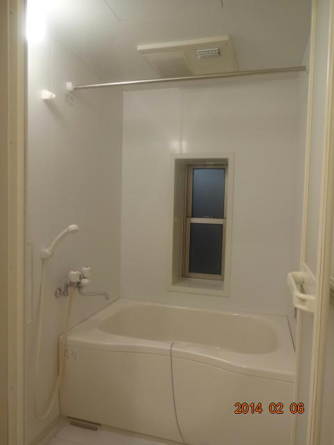 Bath. There is also a window in the bathroom with a dry. 