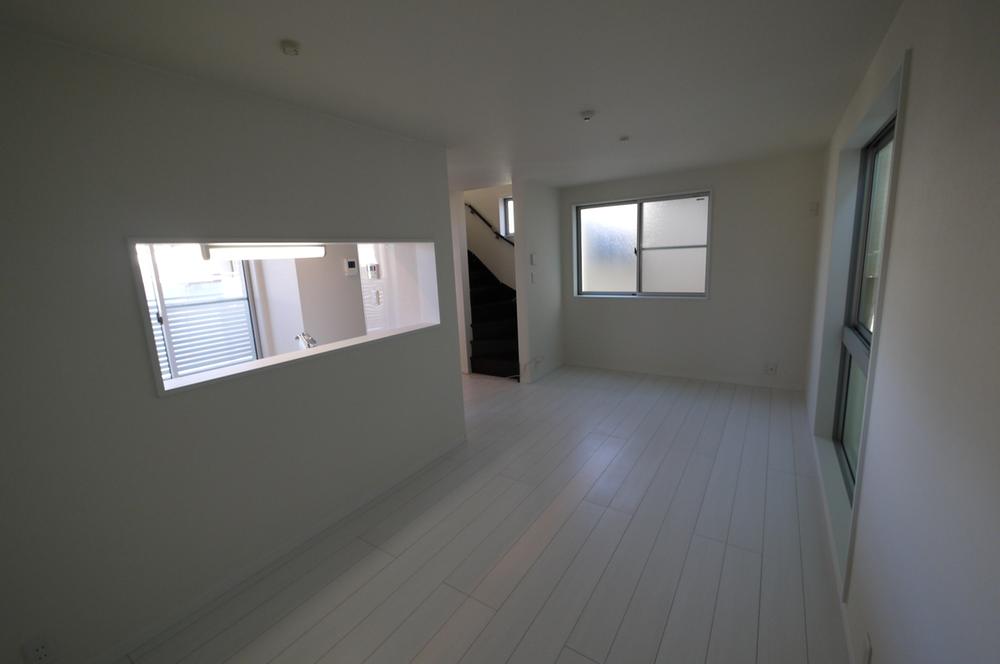 Living. It is convenient to carry the dishes from face-to-face kitchen to dining.