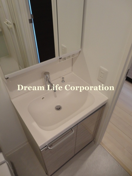 Washroom. ※ In fact the we use the photos in the same building may be different.