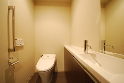 Toilet. It utilizes a photograph of the same building, It might differ from the actual.
