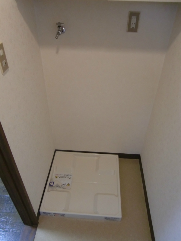 Other Equipment. Washing machine in the room