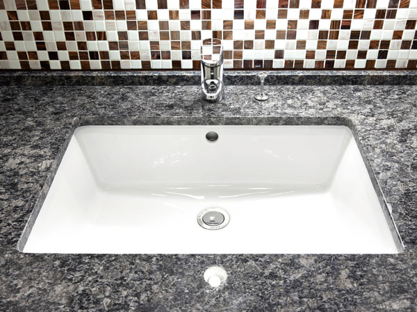 Bathing-wash room.  [Ceramic Square bowl] The granite is in the top plate of the vanity. The sink bowl was adopted pottery made of square type.