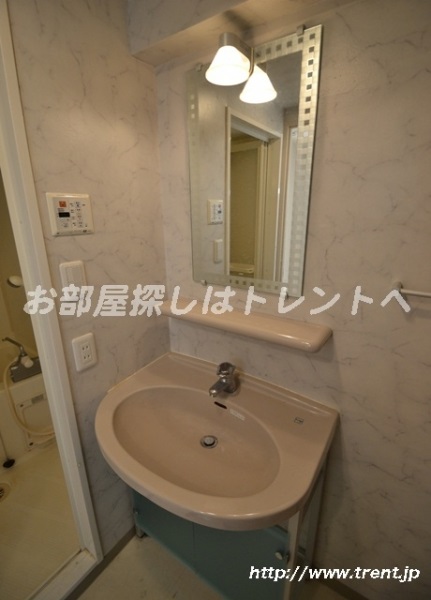 Washroom. We are using a photo of the room of 1K type of the same building. As reference