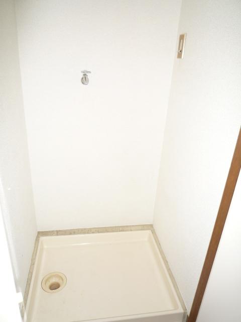 Other Equipment. Washing machine in the room