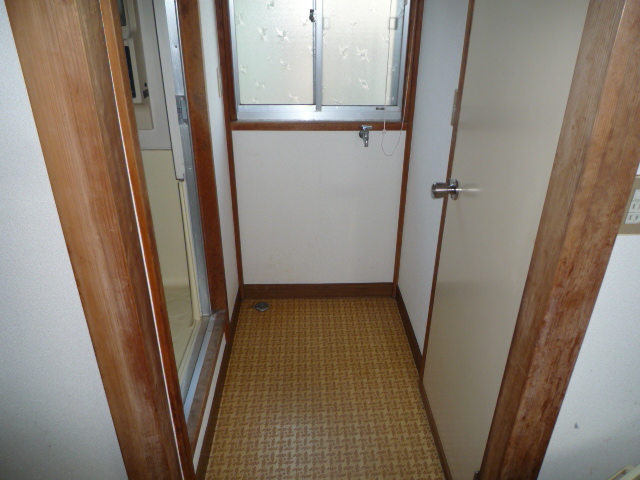 Other room space. Washing machine in the room