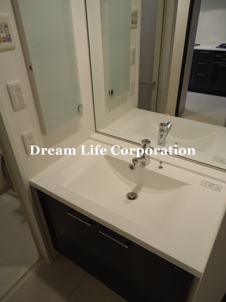 Washroom.  ※ In fact the we use the photos in the same building may be different. 