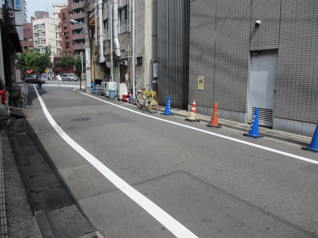 Other. Street in front of the apartment. 2-minute walk from the subway entrance out to the Yasukuni Street.