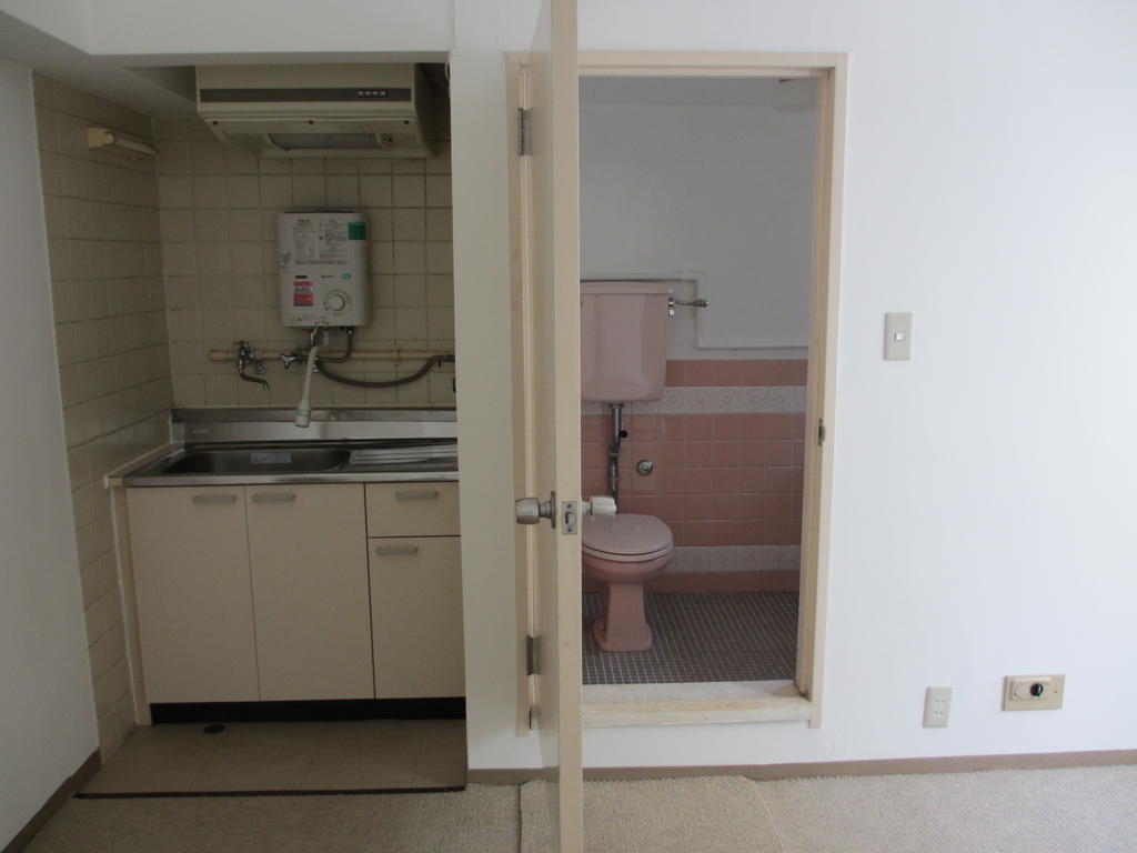 Kitchen. Bathroom in the kitchen next to.