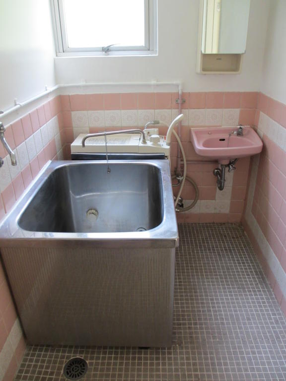 Bath. Let's use is partitioned by a shower curtain! Washing machine is in the bathroom.