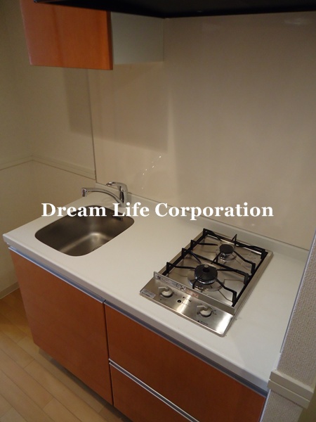 Kitchen.  ※ In fact the we use the photos in the same building may be different. 