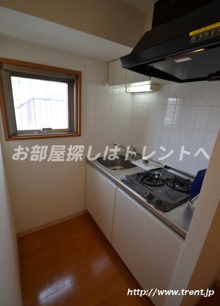 Kitchen. It is a photograph of the same building the fourth floor 1K. Please see for reference.