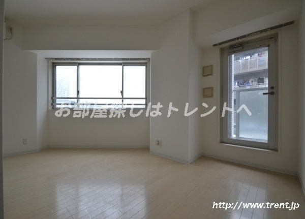 Living and room. It is a studio type of reference photograph of the same building