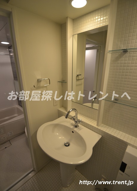 Washroom. It is a photograph of 1K type of the same building. Please see for reference. 
