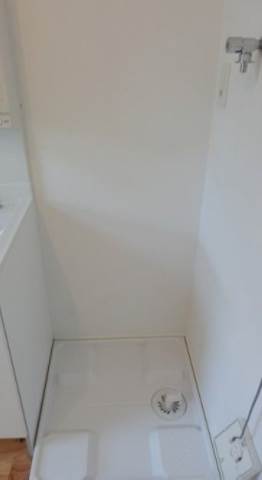 Other Equipment. Washing machine in the room