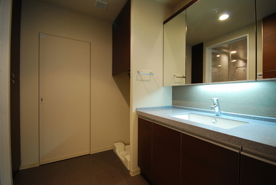 Washroom. It utilizes a photograph of the same building, It might differ from the actual. 