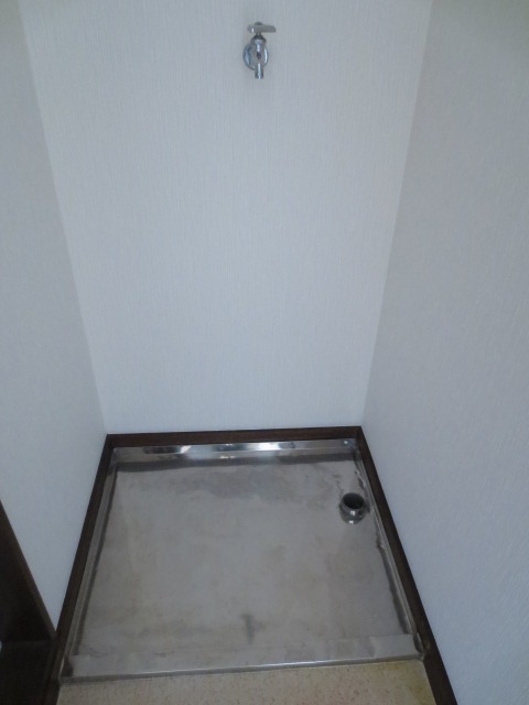 Other Equipment. Washing machine in the room