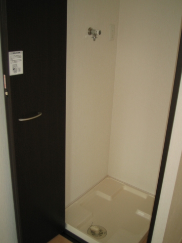 Other Equipment. Washing machine in the room