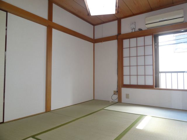Living and room. Sink and washing machine inside the room