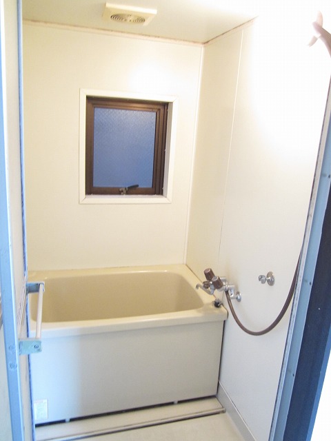 Bath. There is a window in the bathroom