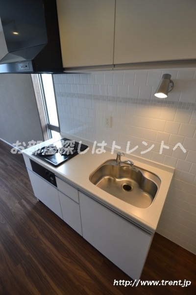 Kitchen. It is a reference photo of the sixth floor of a studio in the same building (another type)