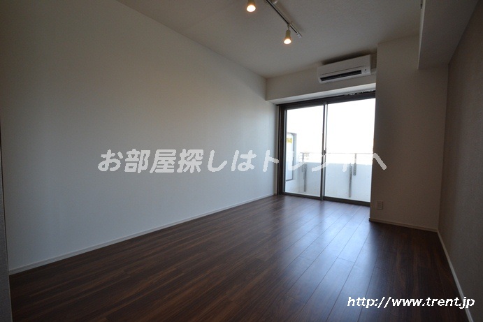 Living and room. It is a reference photo of the sixth floor of a studio in the same building (another type)