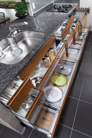 Kitchen.  [Sliding storage] Storage of system kitchens, It can be effectively utilized in the prone cabinet in a dead space, It has adopted a sliding storage.