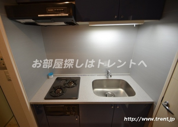 Kitchen. Is a reference photograph of the same building 1K type