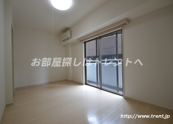 Living and room. Is a reference photograph of the same building 1K type